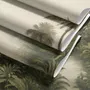 Misty tropical forest wallpaper with palms, pale river and hazy hills in muted green sepia