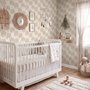 Muted sandy taupe palm trees and pale foliage on a creamy ivory ground tropical wallpaper
