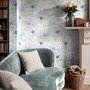 Blue floral wallpaper with watercolour anemone blooms, mint sage leaves and yellow ochre centres on white