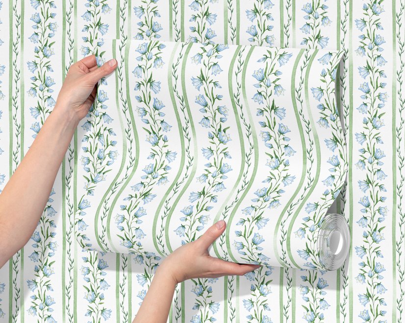Blue floral stripe wallpaper with pale sky-blue bell flowers, green vines and sage bands on white