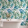 Dark olive green wallpaper with teal and cobalt watercolour lance leaves on a white ground