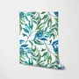 Dark olive green wallpaper with teal and cobalt watercolour lance leaves on a white ground