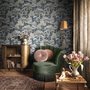 Navy wallpaper with warm ivory and taupe grey toile tree repeat on deep slate blue ground