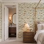 Watercolor fish wallpaper with grey-blue fish, seafoam seaweed, starfish and bubbles on warm cream