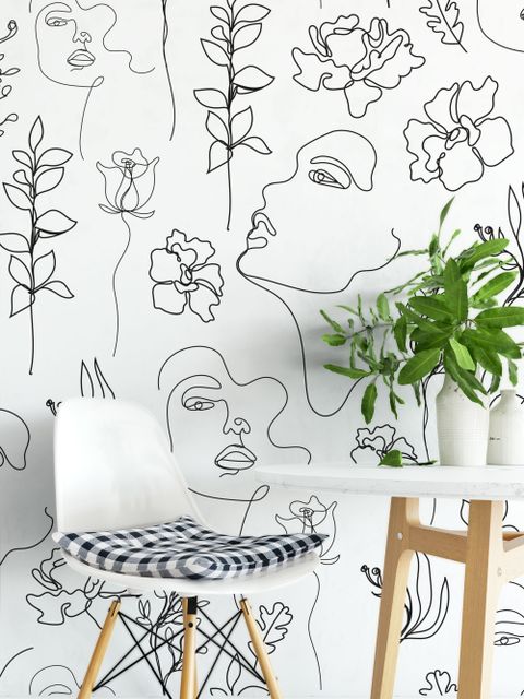 Papier peint visage de femme doux avec dessin floral
