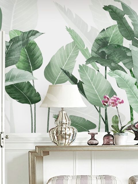 Papier peint panoramique de feuilles tropicales vertes et fraîches