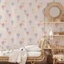 Hot air balloon nursery room wallpaper with watercolour balloons, clouds and stars on a soft blush-pink ground