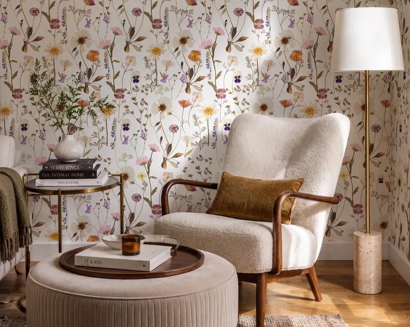 Cute spring wallpaper with pressed ivory, pink, blue and yellow wildflowers on a white ground
