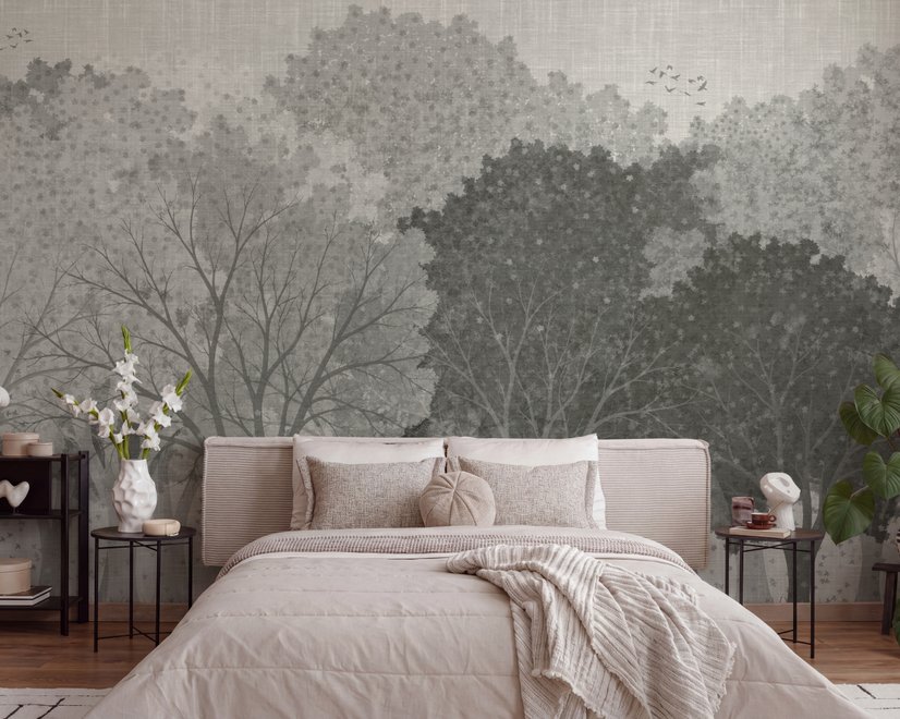 Light gray wallpaper mural with layered ink-wash woodland trees, falling leaves and birds
