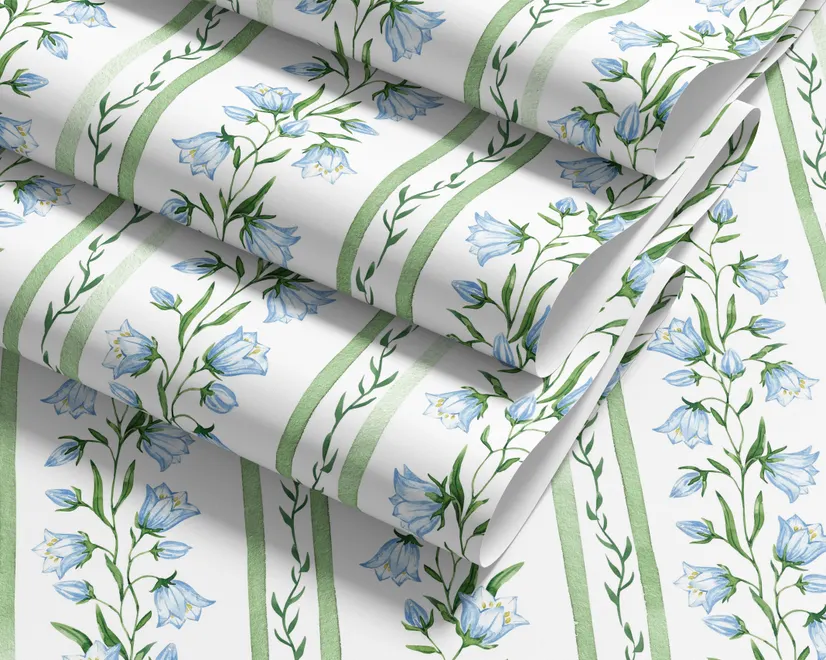Blue floral stripe wallpaper with pale sky-blue bell flowers, green vines and sage bands on white
