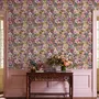 Bold wallpaper for powder room with pop art female faces, pink flowers, black comic panels, mustard, teal and fuchsia details