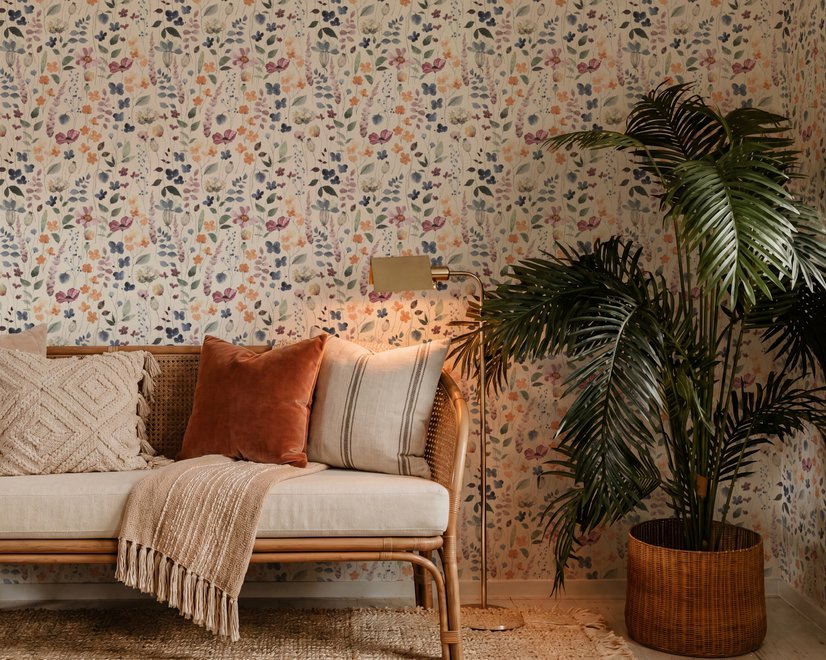 Watercolour floral wallpaper repeat with navy, blue, blush and peach wildflowers on warm cream