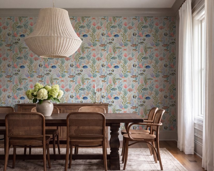 Modern coastal wallpaper with watercolour tropical fish, coral, seaweed, shells and bubbles on light aqua-blue
