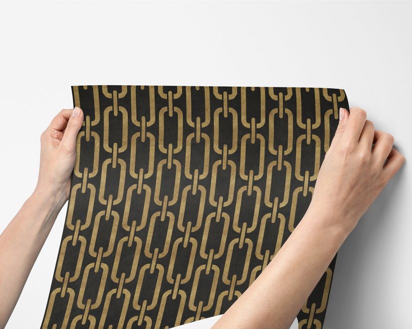 Black wallpaper with gold vertical chain link Art Deco repeat on a textured charcoal ground