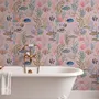 Cute pink seashell wallpaper with watercolour reef fish, coral, seaweed, starfish and shells on blush pink