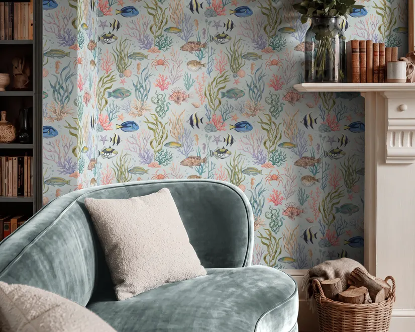 Modern coastal wallpaper with watercolour tropical fish, coral, seaweed, shells and bubbles on light aqua-blue