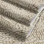 Abstract taupe and greige wallpaper with creamy white oval brush marks in flowing currents