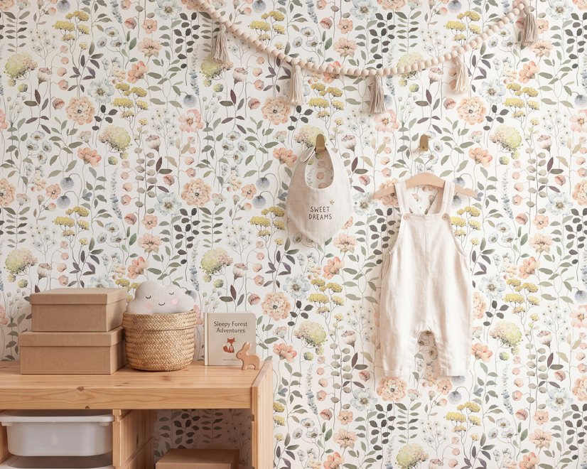 Watercolour wildflower wallpaper with pastel flowers and sage leaves on a white ground