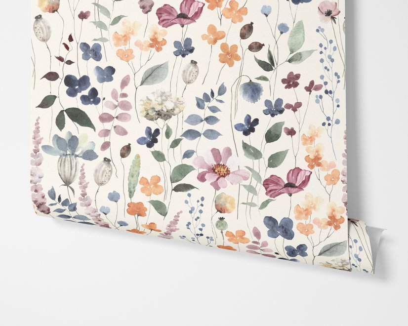 Watercolour floral wallpaper repeat with navy, blue, blush and peach wildflowers on warm cream