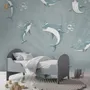 Papier peint panoramique pour la chambre d'enfant du dauphin en train de jouer
