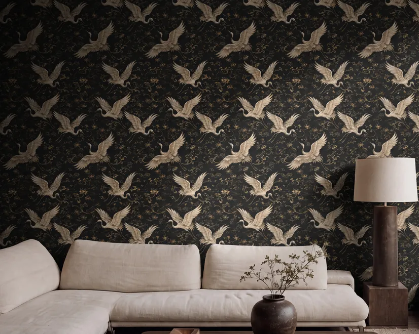 Ivory cranes and antique gold lotus flowers on charcoal-black Japanese lotus wallpaper