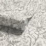 Black outline botanical wallpaper with charcoal wildflowers and grasses on a warm ivory cream ground