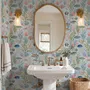 Modern coastal wallpaper with watercolour tropical fish, coral, seaweed, shells and bubbles on light aqua-blue