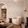 Cute spring wallpaper with pressed ivory, pink, blue and yellow wildflowers on a white ground