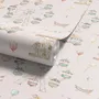 Children's playroom wallpaper with pastel Ferris wheel, carousel horses, tents and balloons on blush pink