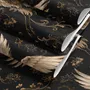 Ivory cranes and antique gold lotus flowers on charcoal-black Japanese lotus wallpaper