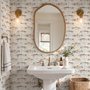 Watercolor fish wallpaper with trout, seashells and pale aqua washes on a warm cream ground