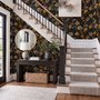 Japanese art wallpaper pattern with koi fish, gold peonies, mauve flowers and grey clouds on black