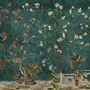Floral wallpaper with birds in a teal chinoiserie garden with blossoms, pheasant, palms and stone railings