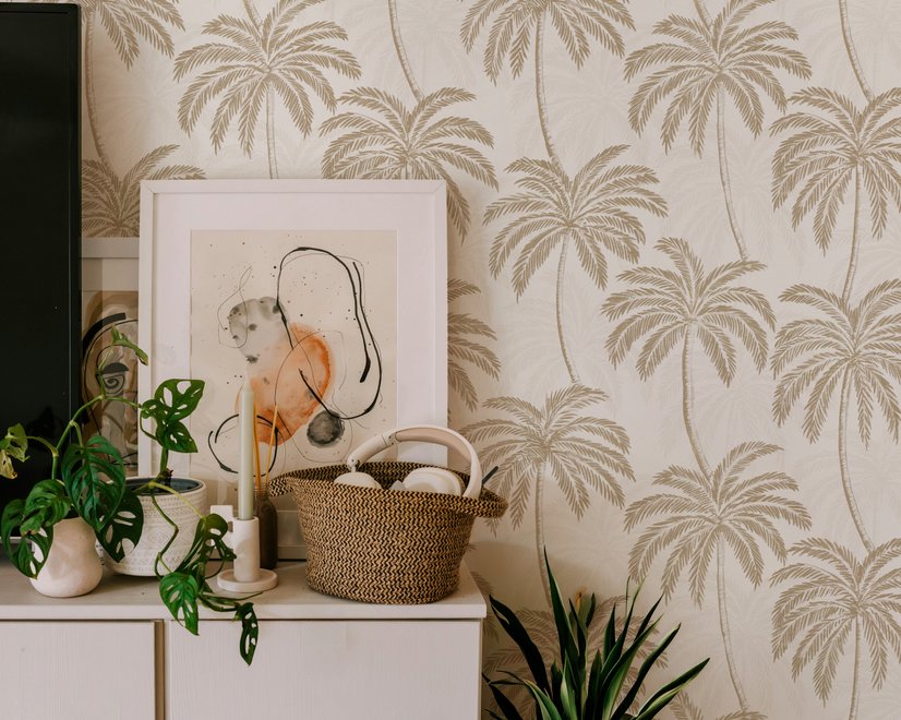 Muted sandy taupe palm trees and pale foliage on a creamy ivory ground tropical wallpaper