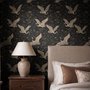 Ivory cranes and antique gold lotus flowers on charcoal-black Japanese lotus wallpaper