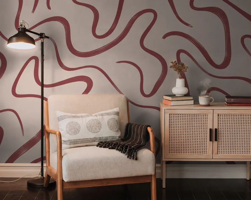 Burgundy-red looping contour lines on blush cream pink wallpaper mural
