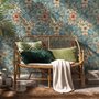 Blue tropical wallpaper with hibiscus, orchids, lilies, monstera leaves and palm fronds on a deep teal-blue ground