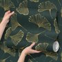 Dark green wallpaper with metallic antique-gold etched ginkgo leaves on a textured forest-green teal ground