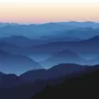 Mountain Silhouette at Sunset Wallpaper Mural
