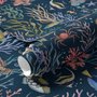Aquarium fish tank wallpaper repeat with tropical fish, coral, seaweed, shells and bubbles on deep navy blue