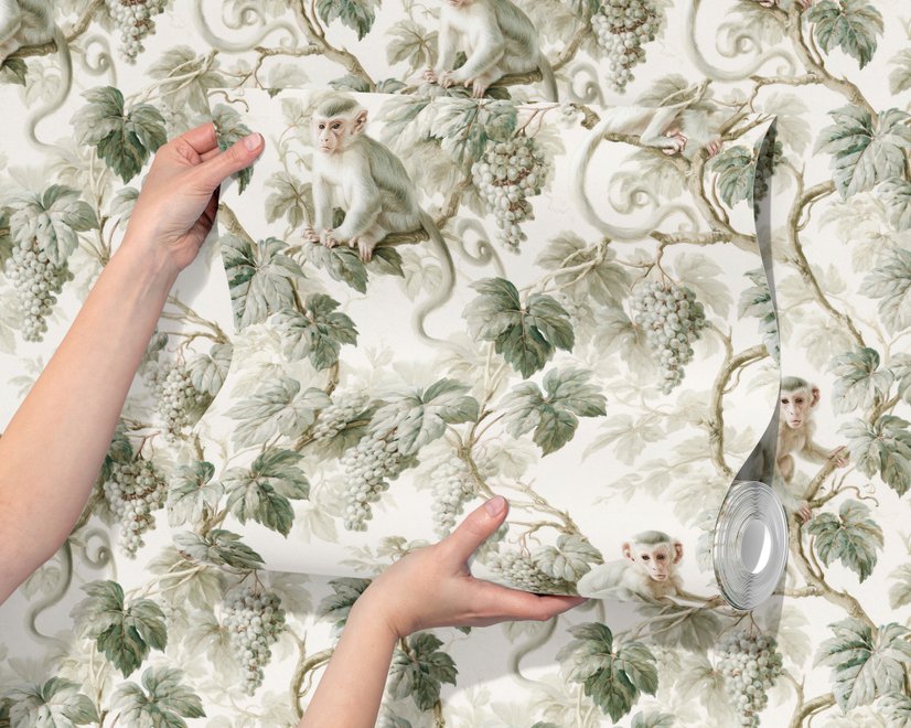 Vintage nature wallpaper with pale monkeys, sage grape leaves, white grape clusters and taupe vines on ivory.