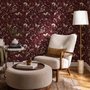Pink butterflies wallpaper on a claret ground with cream flowers, moons, stars and spotted mushrooms.