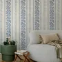 Blue wallpaper with indigo botanical stripework, pinstripes and dotted borders on warm cream parchment