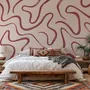 Burgundy-red looping contour lines on blush cream pink wallpaper mural