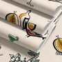 Bar area wallpaper with hand drawn cocktails, liquor bottles, citrus and fruit bowls on warm cream