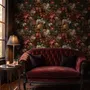 Dark moody floral wallpaper with cream peonies, coral lilies, berries and green foliage on chocolate brown