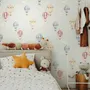 Watercolor blue wallpaper with hot air balloons, cream clouds and peach stars on pale sage green