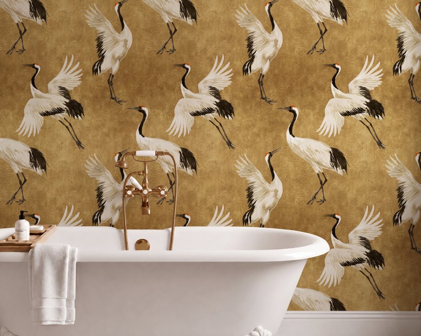 Japanese crane wallpaper with white, black and red cranes in flight on an antique-gold textured ground