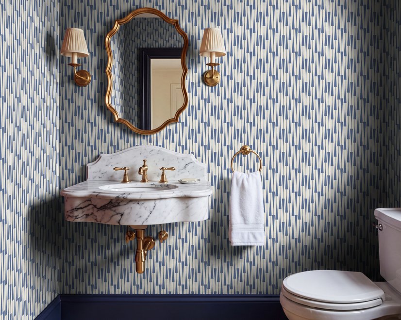 Cream colored wallpaper with denim blue geometric totem stripe repeat on a linen texture ground