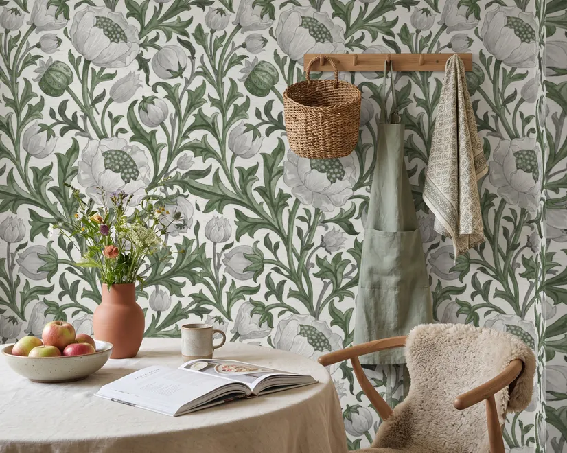 Sage green botanical floral wallpaper with white poppy flowers, lobed leaves and dotted seed centres
